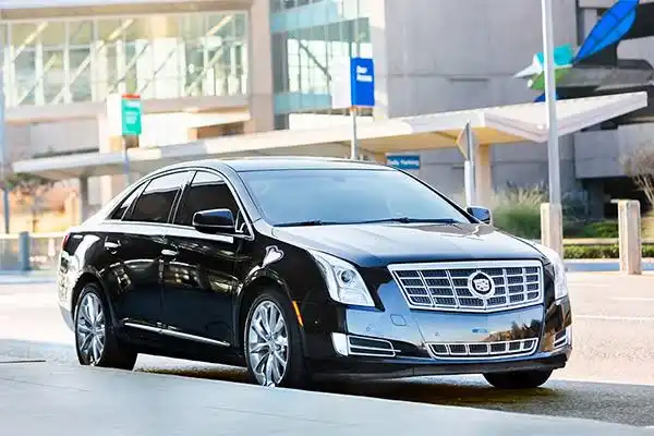 Black Luxury Sedan Near Airport